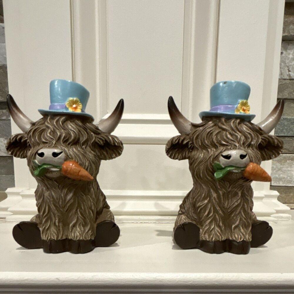 Hobby Lobby Set of 2 Resin Highland Cow Figurines Blue Hats w/ Carrots -3x4.5 in